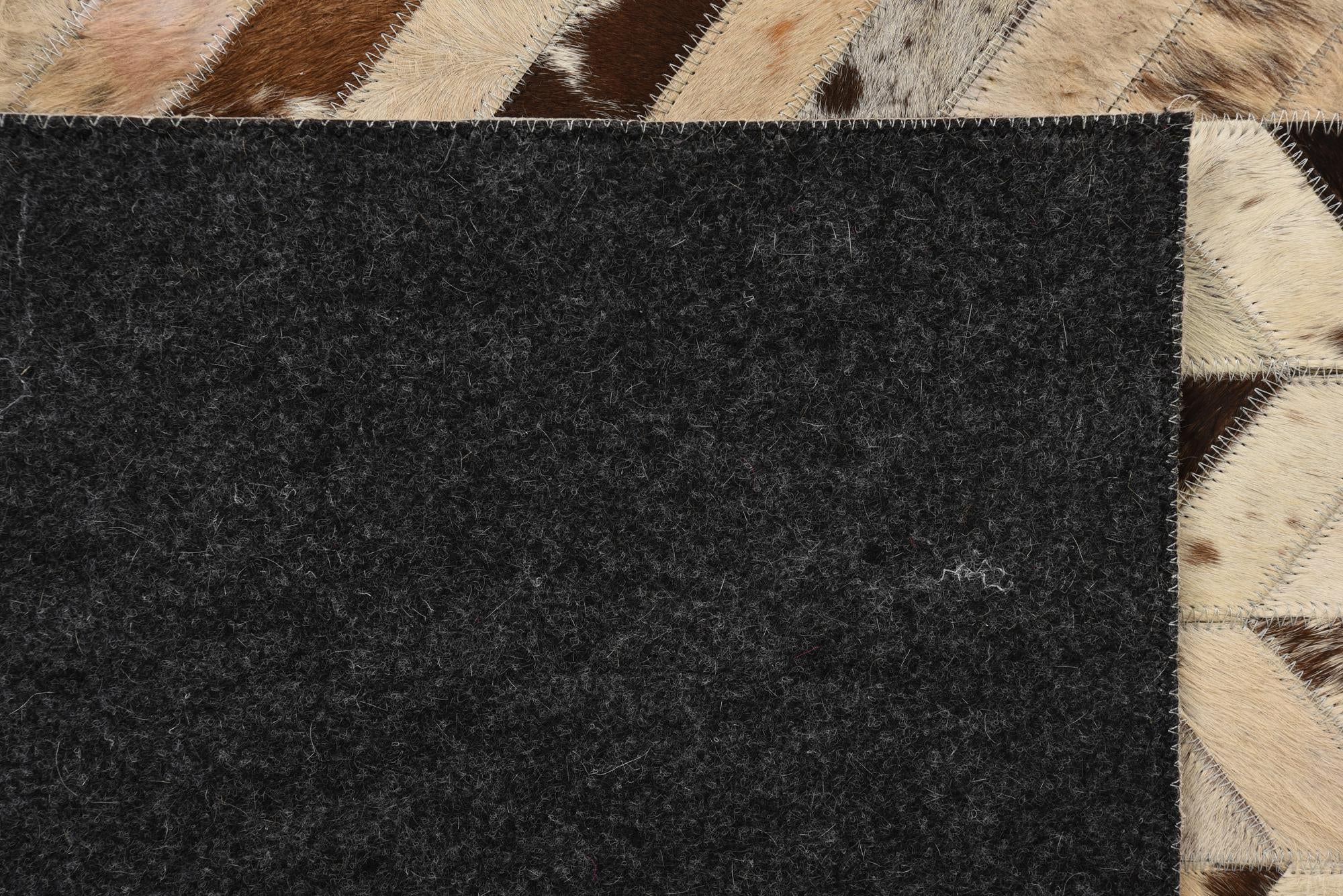 5' 1 x 8' Cowhide Rug