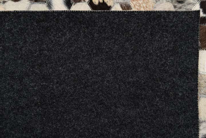 5' 1 x 8' Cowhide Rug