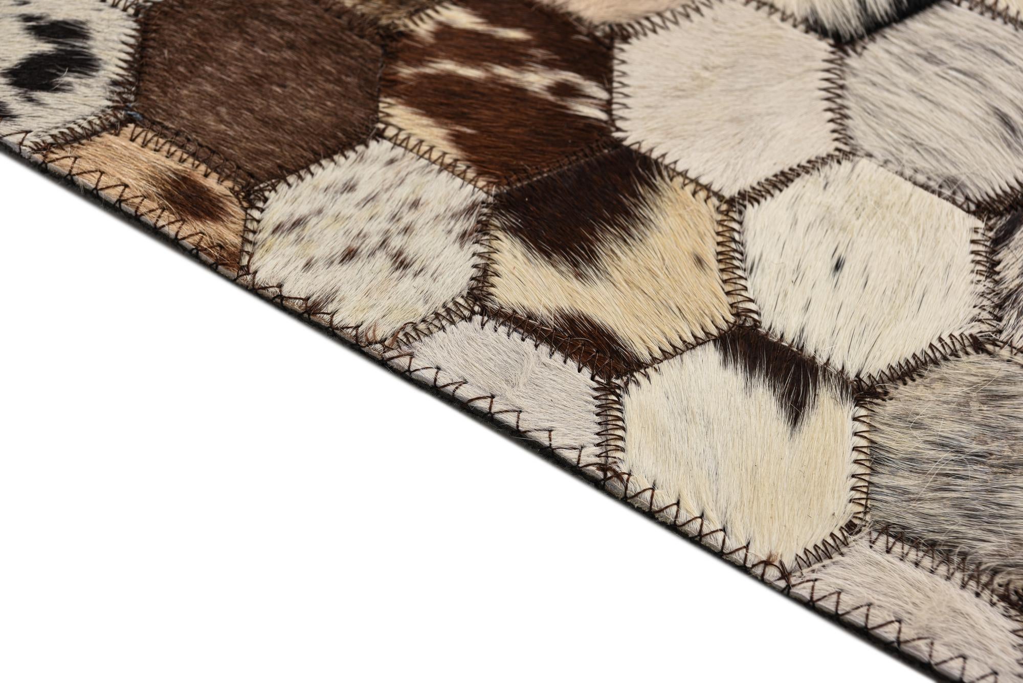 5' 1 x 8' 2 Cowhide Rug