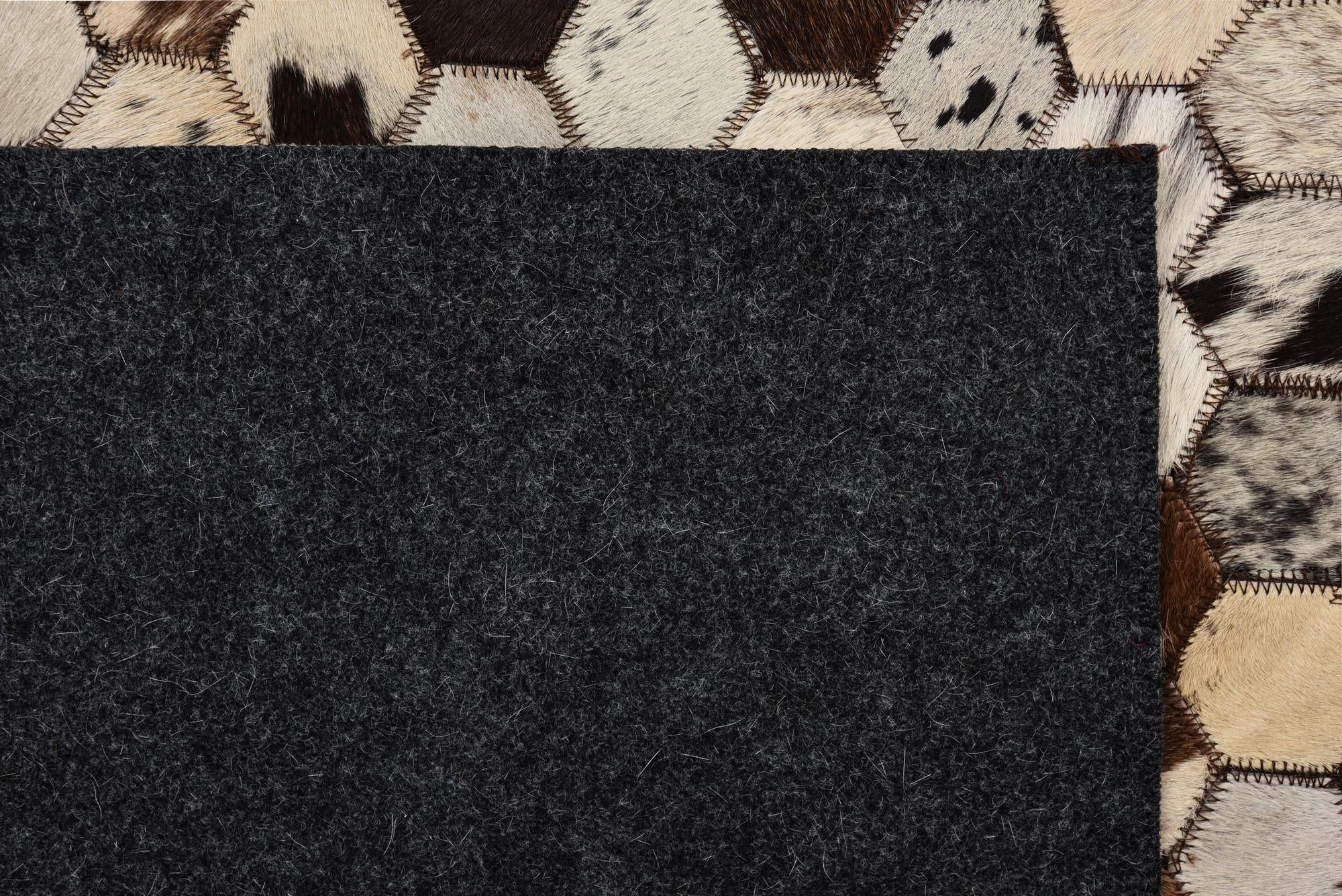 5' 1 x 8' 2 Cowhide Rug