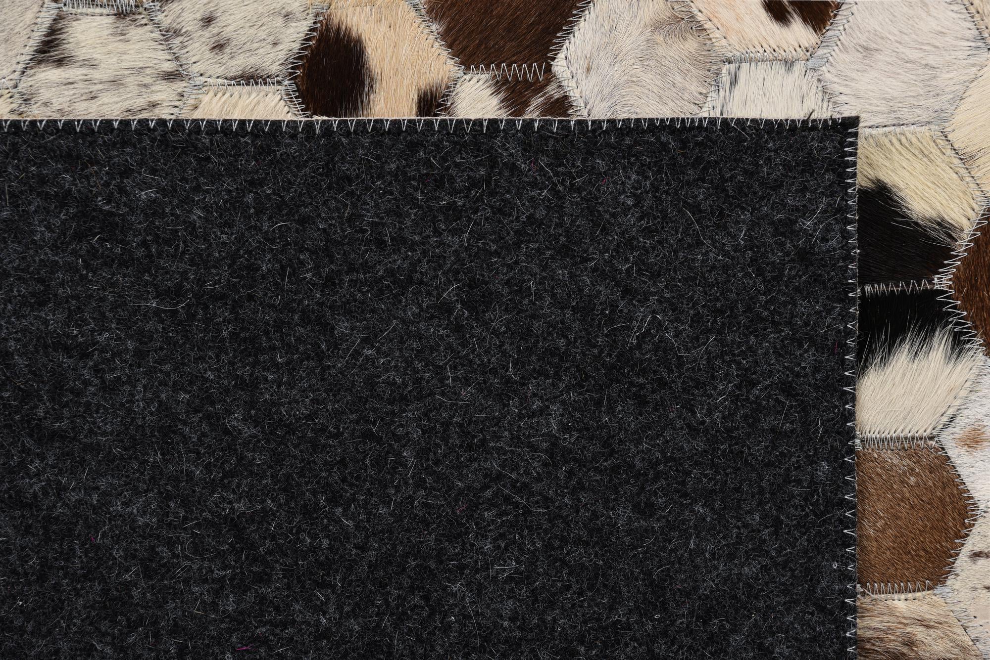 5' 1 x 7' 10 Cowhide Rug