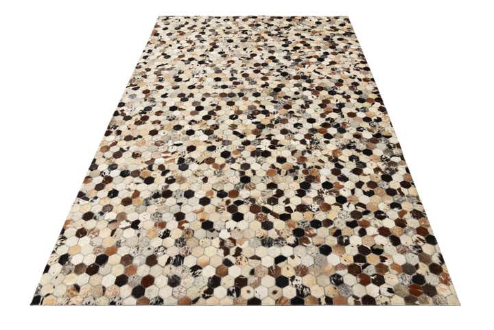 5' 2 x 8' 1 Cowhide Rug