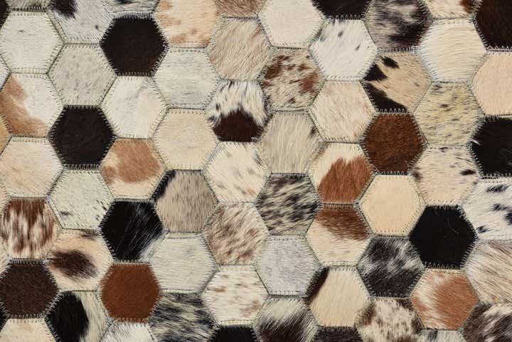 5' 2 x 8' 1 Cowhide Rug