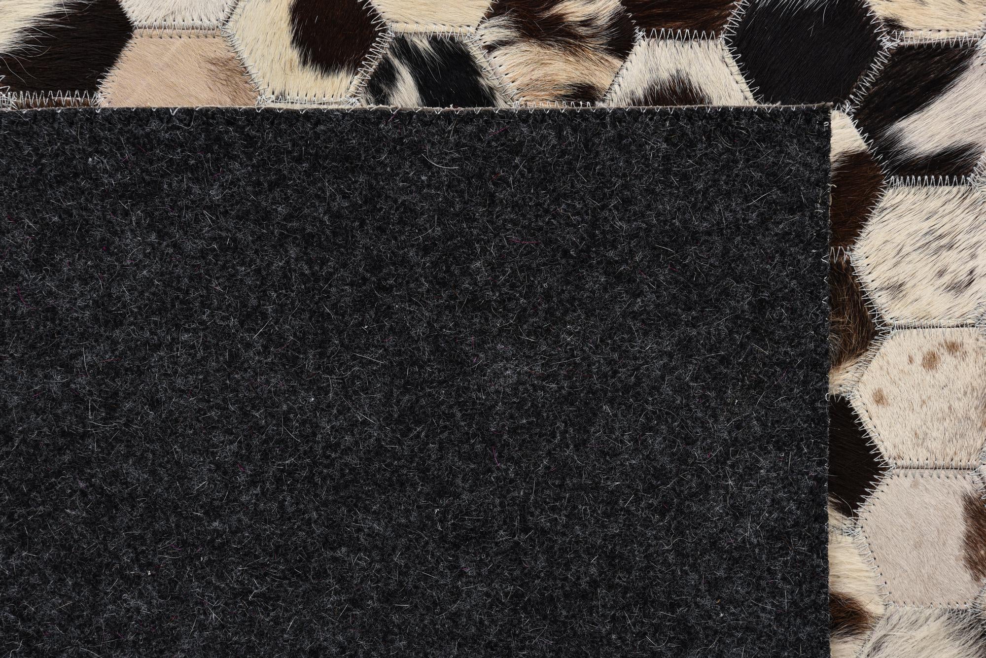 5' 1 x 8' Cowhide Rug