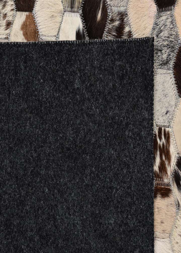 5' 1 x 7' 10 Cowhide Rug