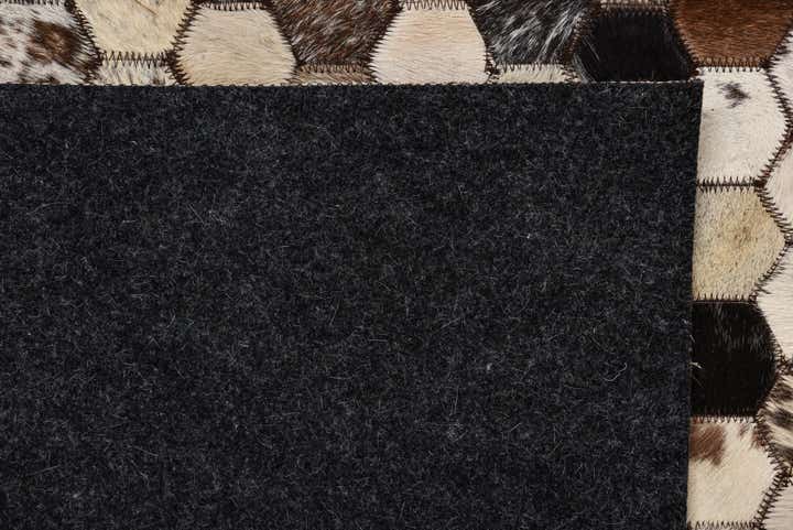 5' 1 x 8' 2 Cowhide Rug