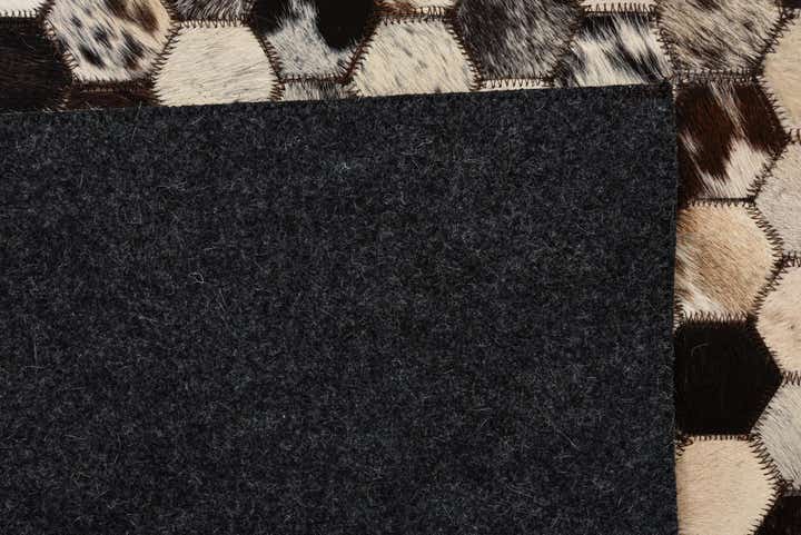 5' 1 x 8' 1 Cowhide Rug