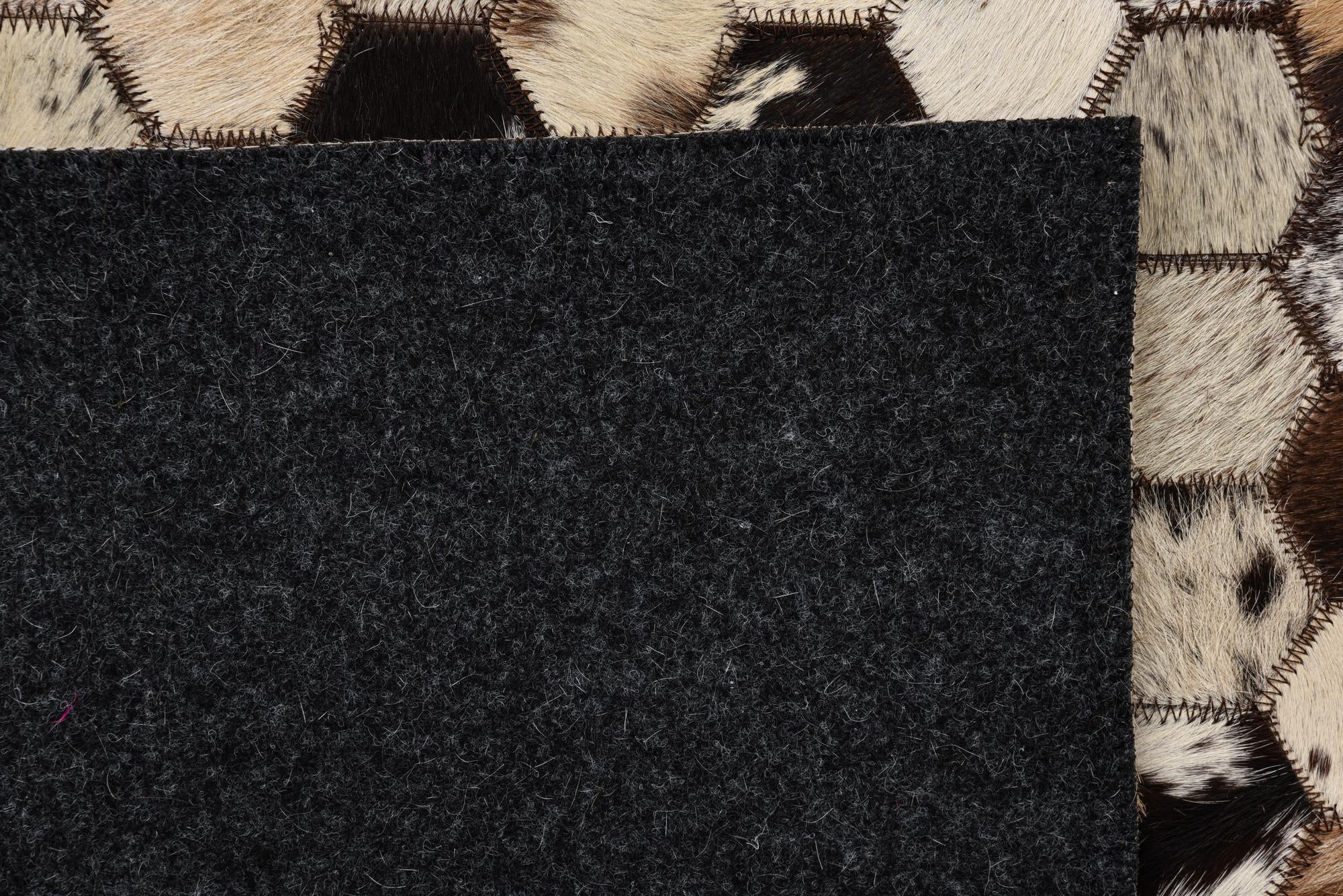 5' 1 x 8' 2 Cowhide Rug