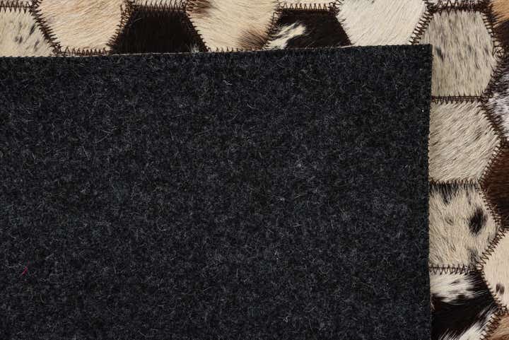 5' 1 x 8' 2 Cowhide Rug