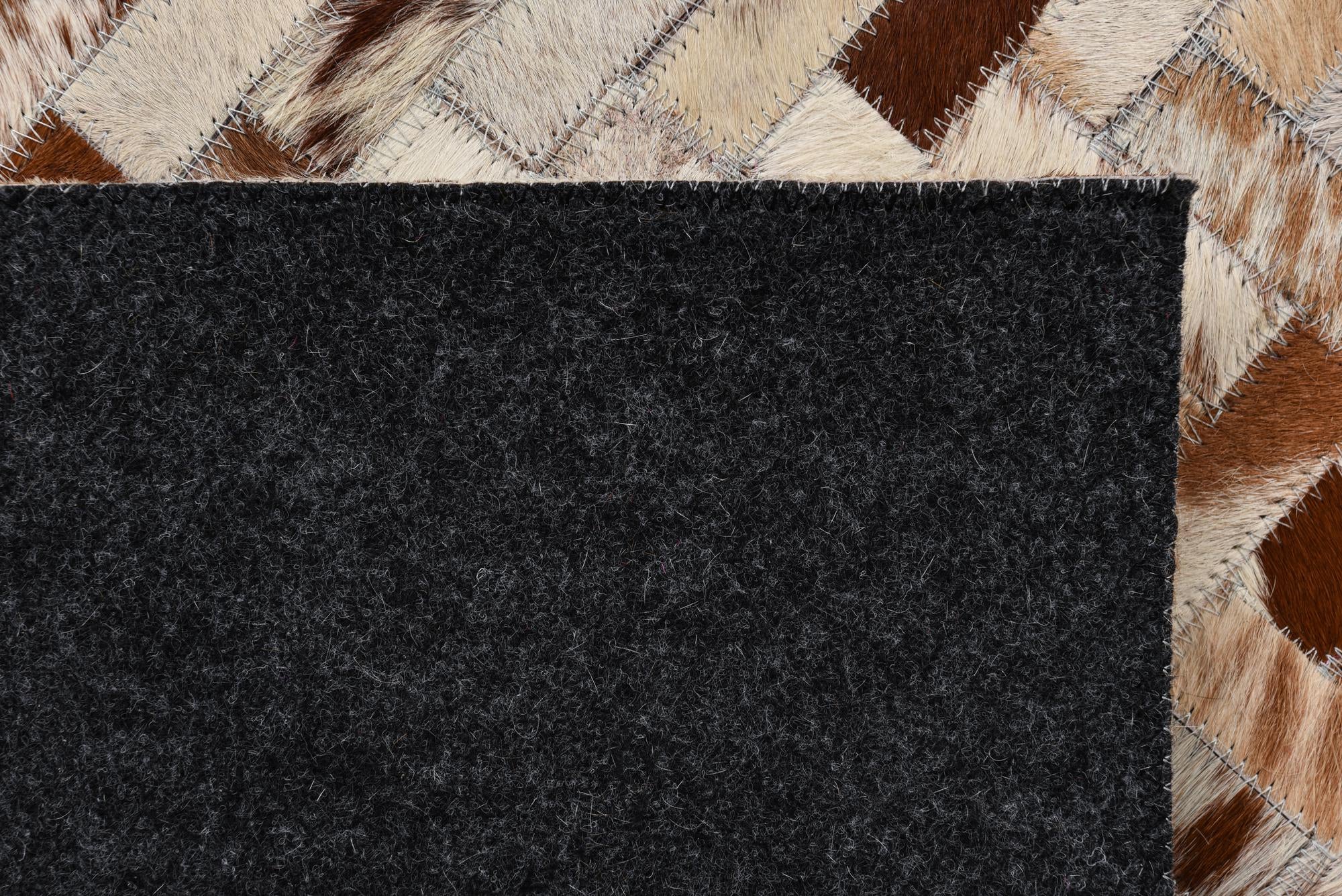 4' 10 x 7' 10 Cowhide Rug