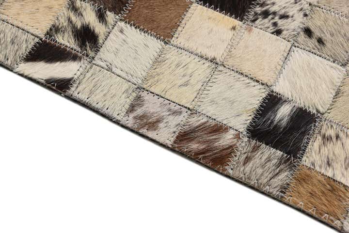 5' 1 x 8' Cowhide Rug
