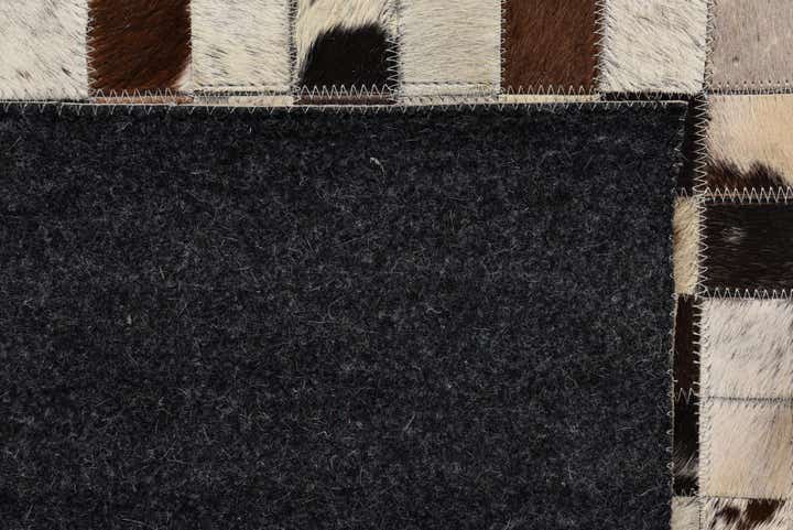 5' 1 x 8' Cowhide Rug