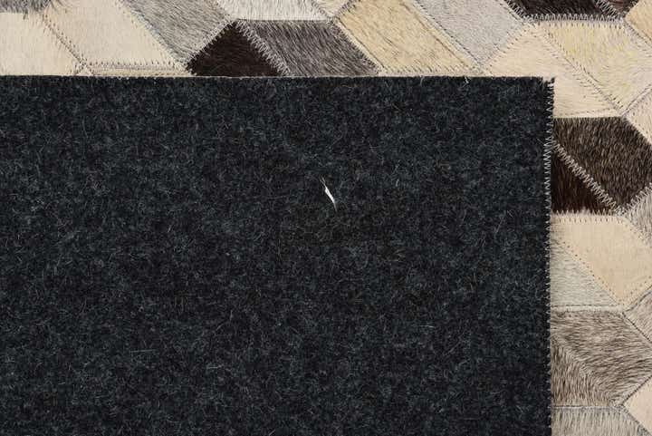 5' 2 x 7' 5 Cowhide Rug