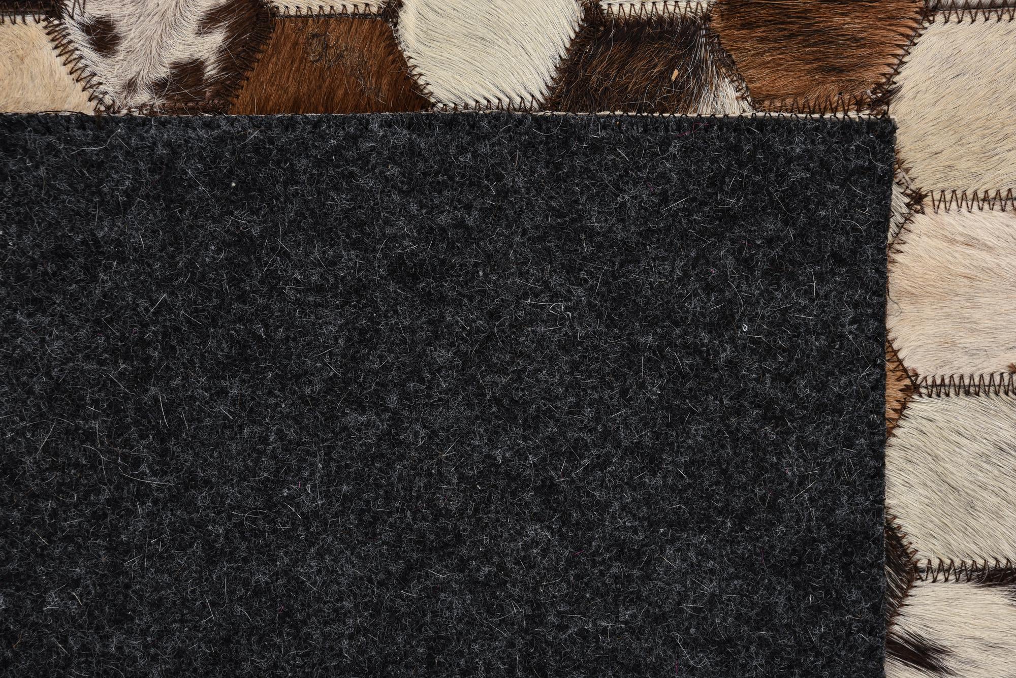 5' 3 x 8' 1 Cowhide Rug