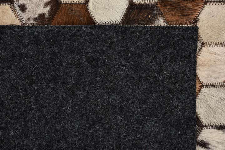 5' 3 x 8' 1 Cowhide Rug