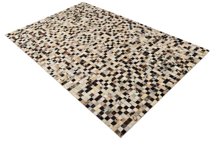 5' 2 x 8' 1 Cowhide Rug