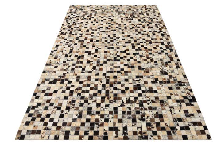 5' 2 x 8' 1 Cowhide Rug