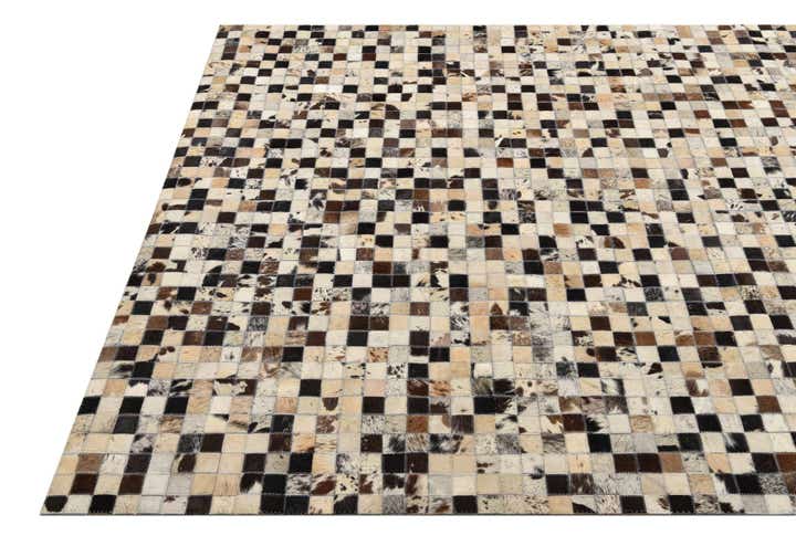 5' 2 x 8' 1 Cowhide Rug