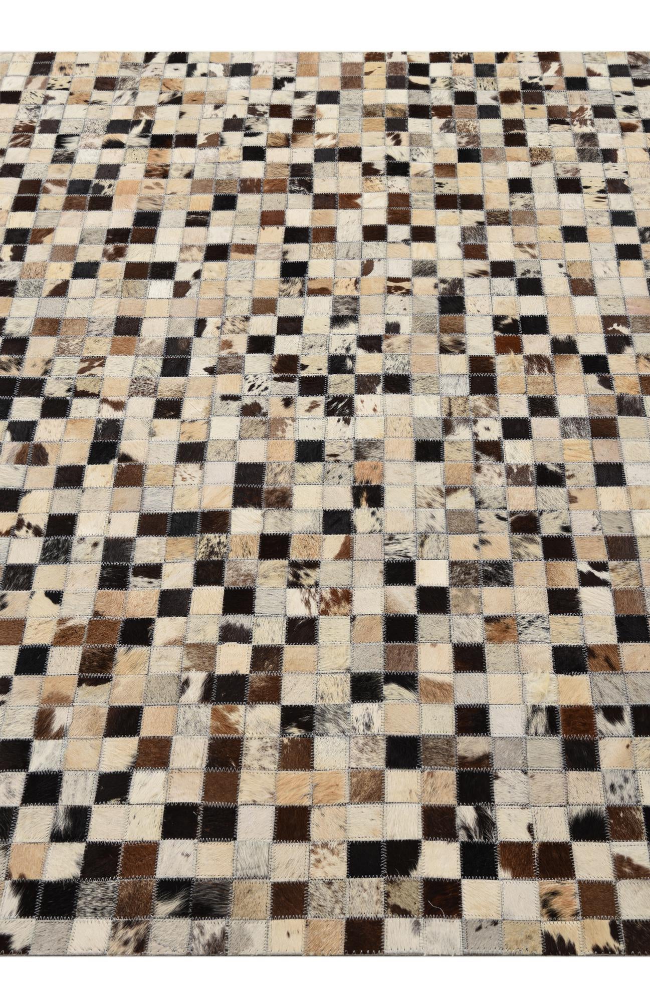 5' 2 x 8' 1 Cowhide Rug