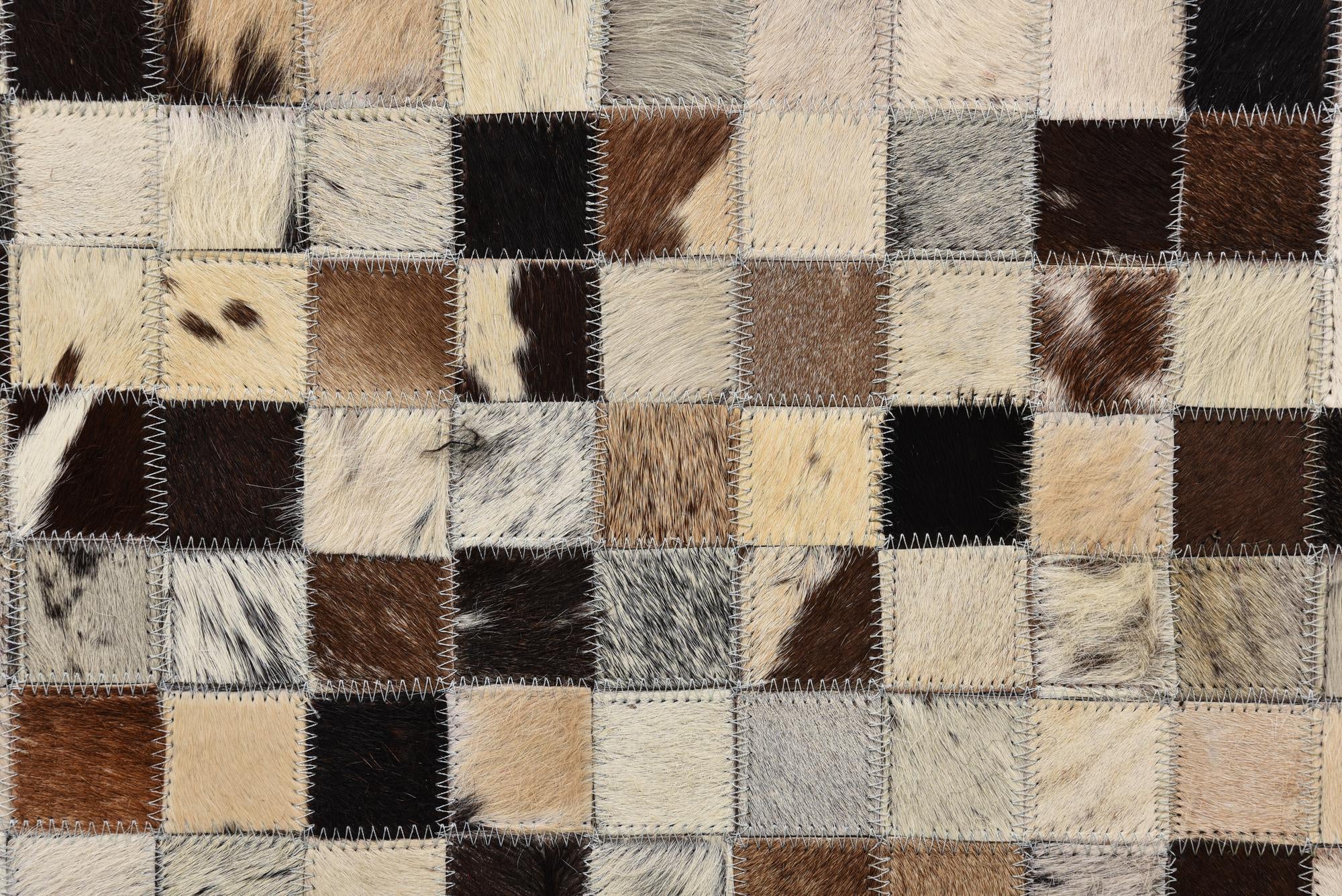 5' 2 x 8' 1 Cowhide Rug