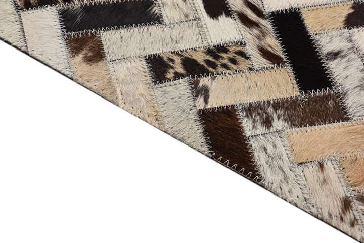 5' 1 x 8' 1 Cowhide Rug
