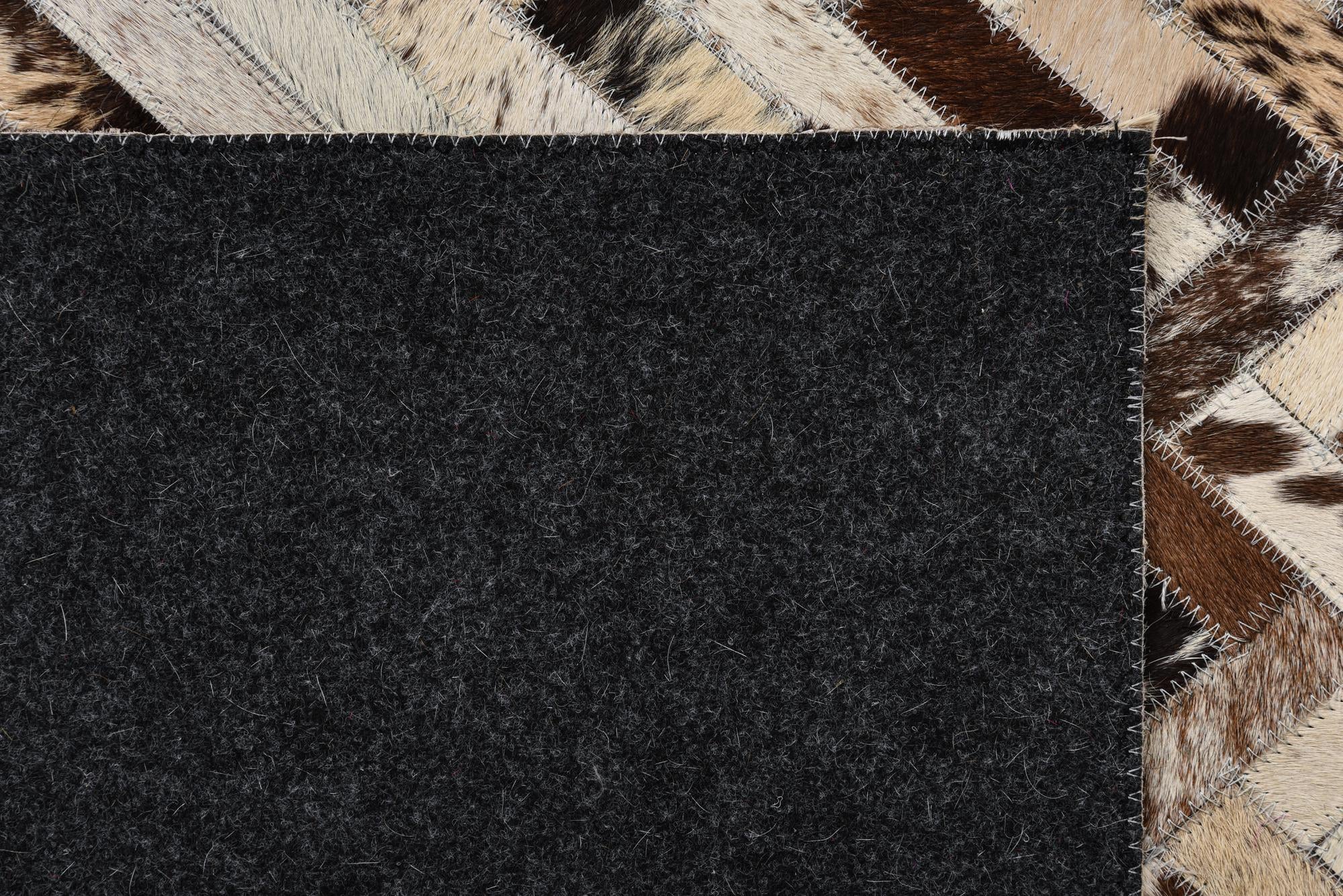 5' 1 x 8' 1 Cowhide Rug