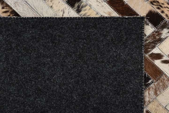 5' 1 x 8' 1 Cowhide Rug