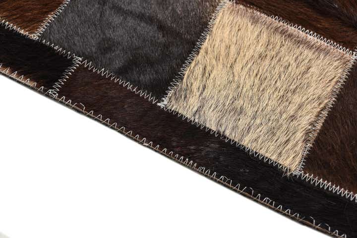 5' 1 x 8' Cowhide Rug