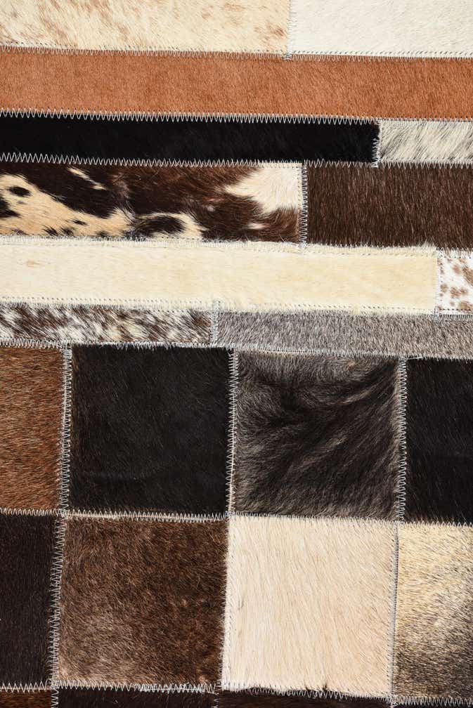 5' 1 x 8' Cowhide Rug
