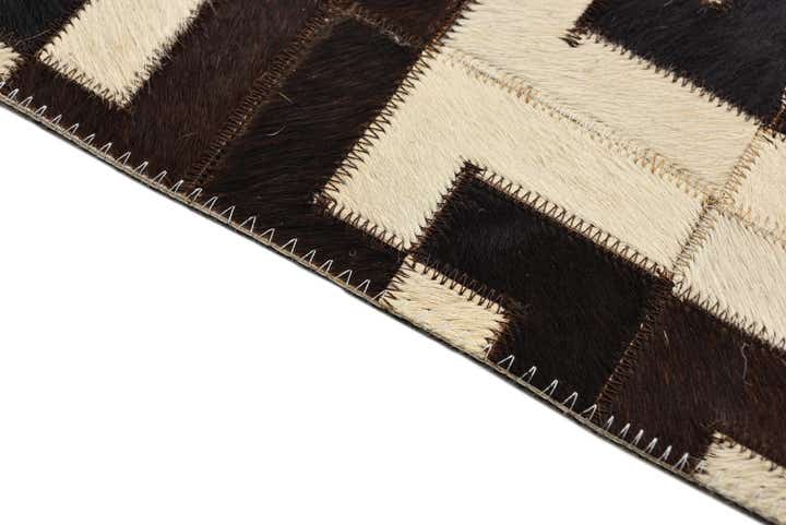 5' 1 x 6' 10 Cowhide Rug