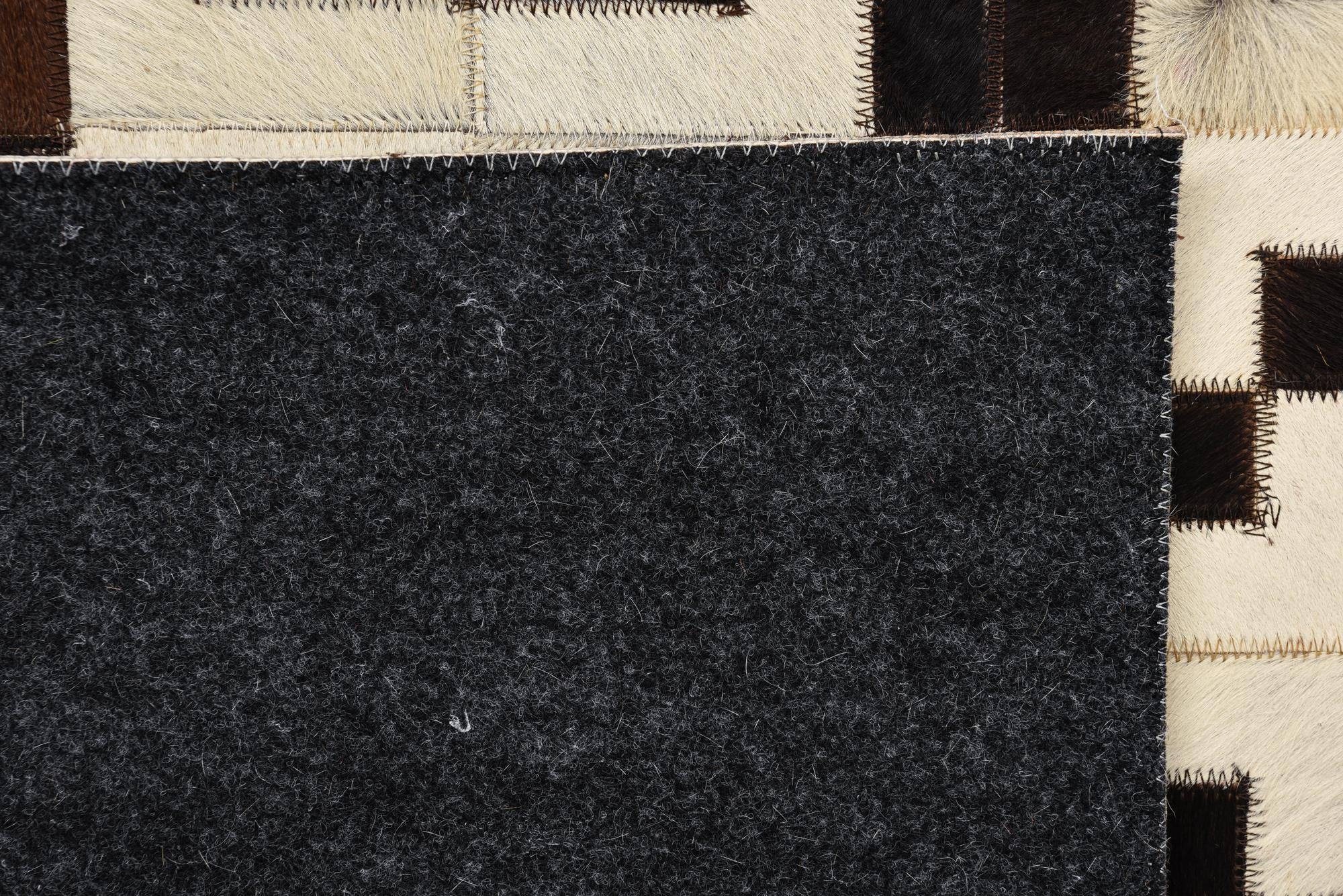 5' 1 x 6' 10 Cowhide Rug