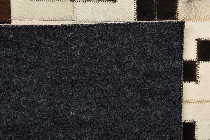 5' 1 x 6' 10 Cowhide Rug