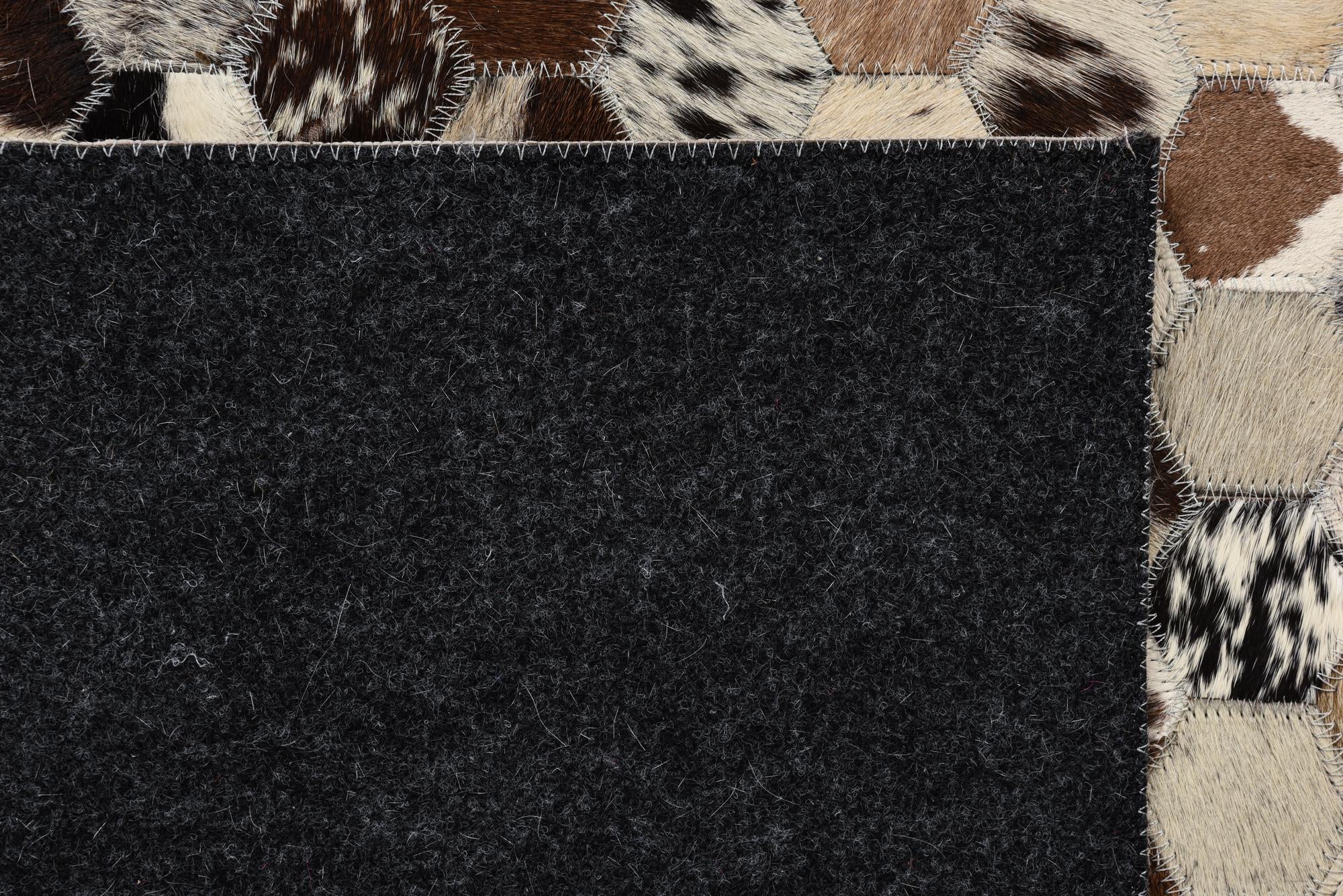 5' 1 x 8' Cowhide Rug