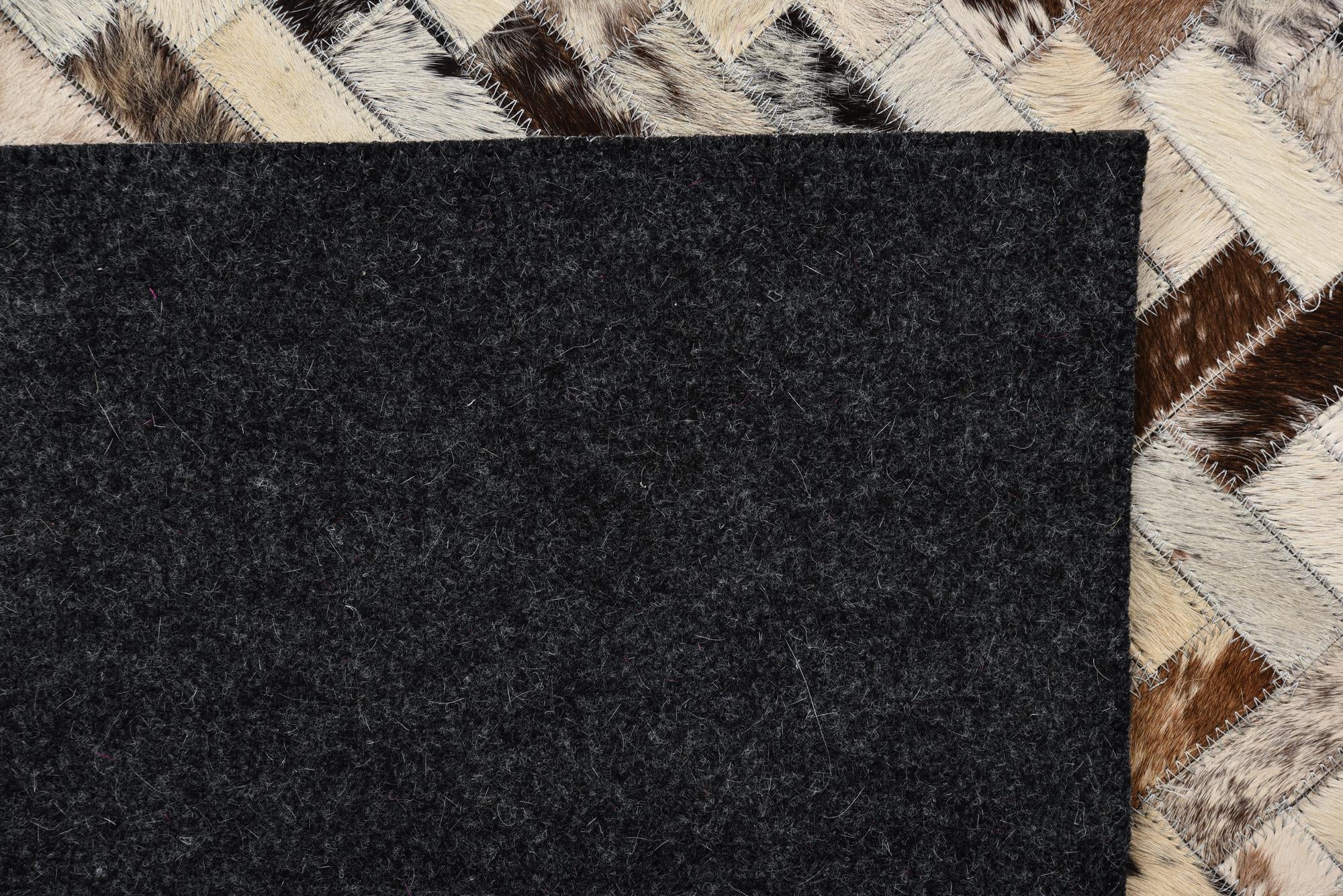 5' 2 x 8' Cowhide Rug
