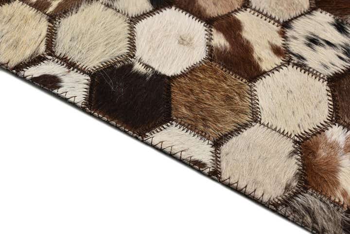 5' 1 x 8' 2 Cowhide Rug