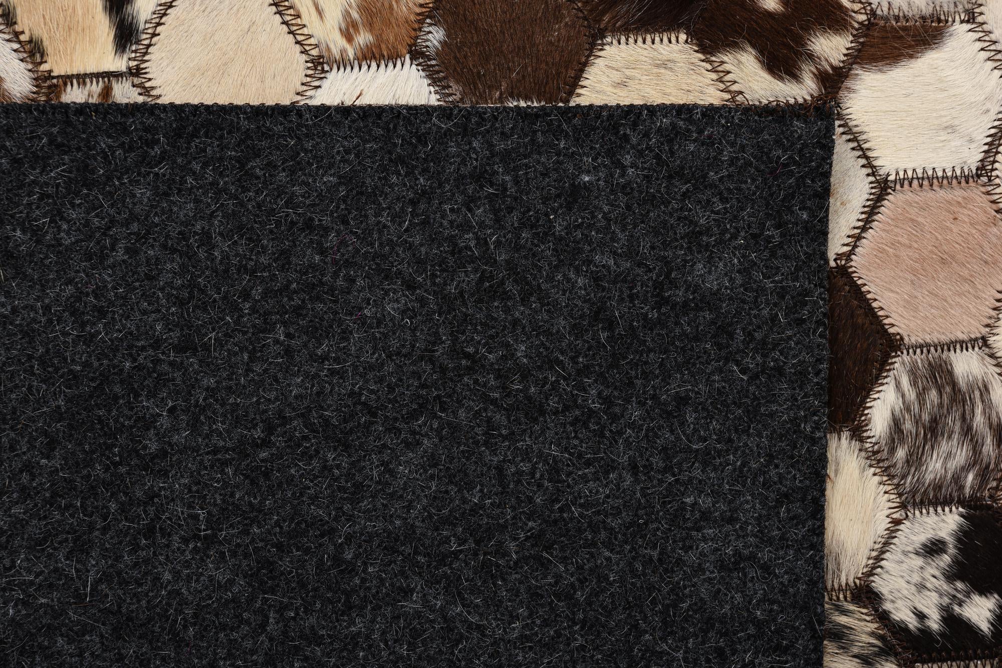 5' 1 x 8' 2 Cowhide Rug