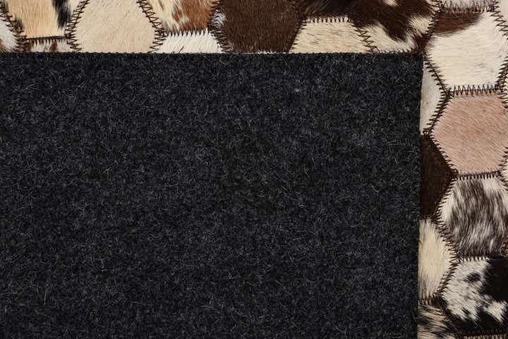5' 1 x 8' 2 Cowhide Rug