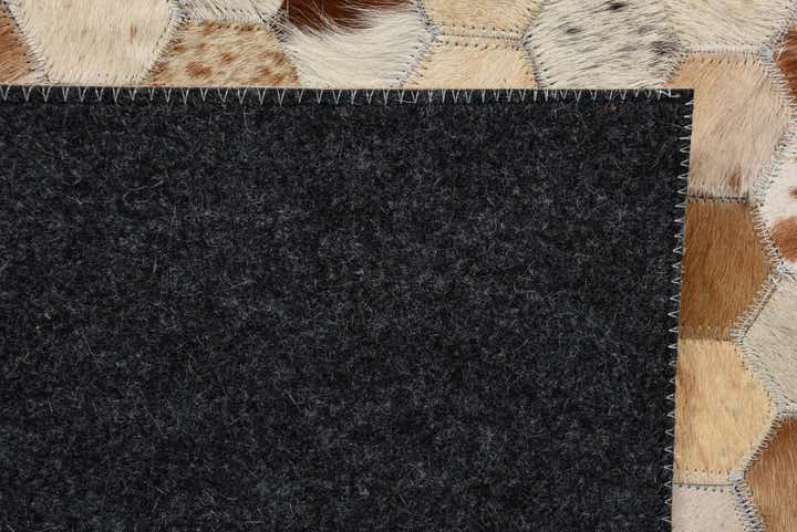 5' 1 x 8' Cowhide Rug