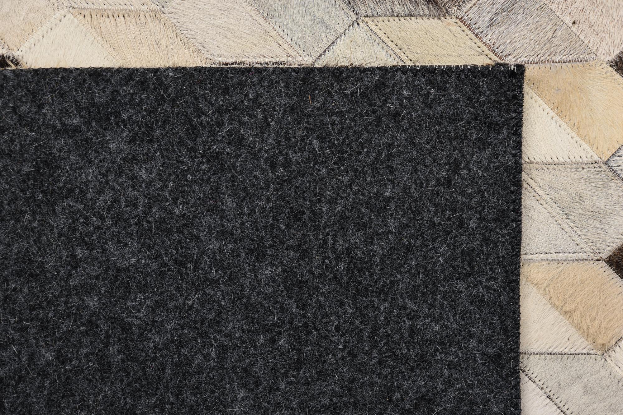 5' 2 x 7' 5 Cowhide Rug