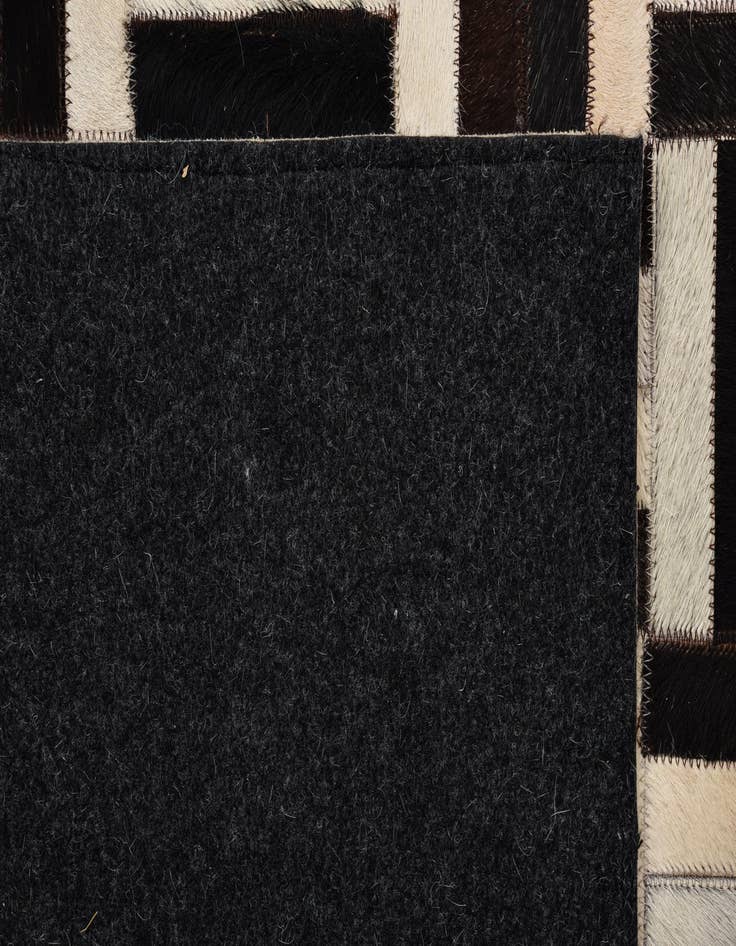 Detail image of 5' 4 x 8' 2 Cowhide Rug