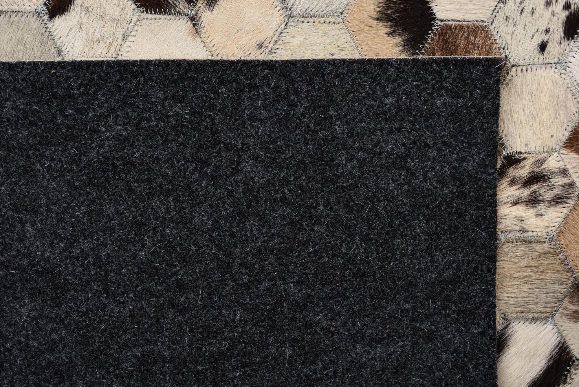 5' 1 x 7' 10 Cowhide Rug