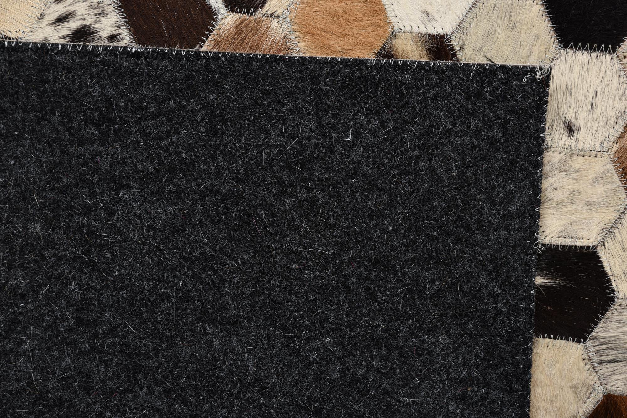 5' 1 x 8' Cowhide Rug