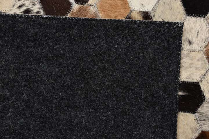 5' 1 x 8' Cowhide Rug
