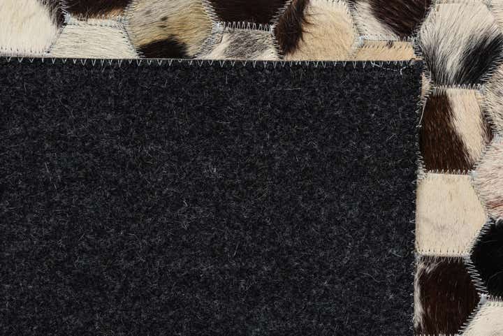 5' 1 x 8' Cowhide Rug
