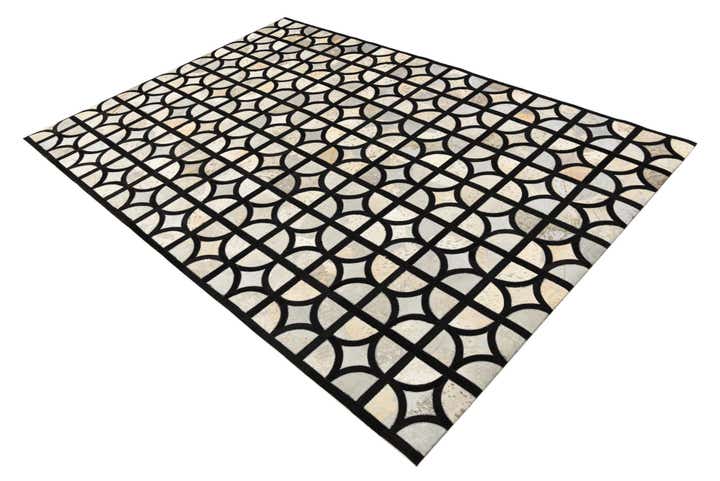5' 3 x 7' 8 Cowhide Rug
