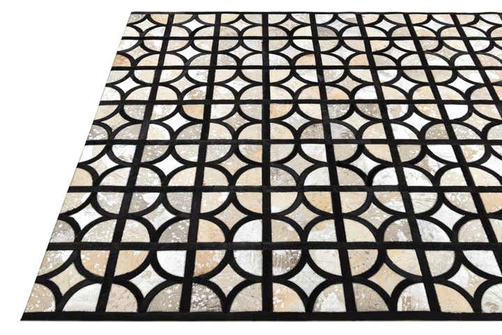 5' 2 x 7' 6 Cowhide Rug