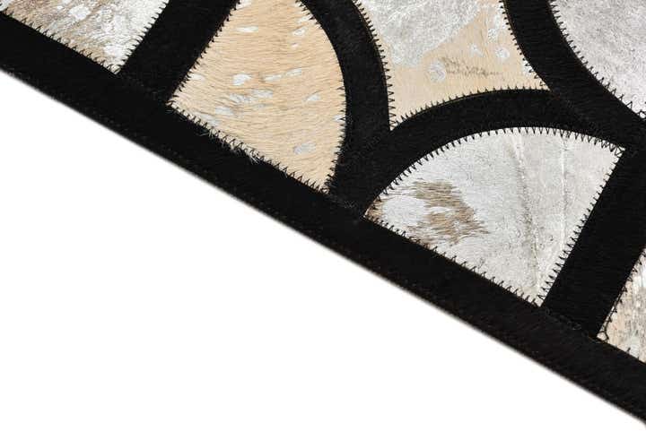 5' 2 x 7' 6 Cowhide Rug