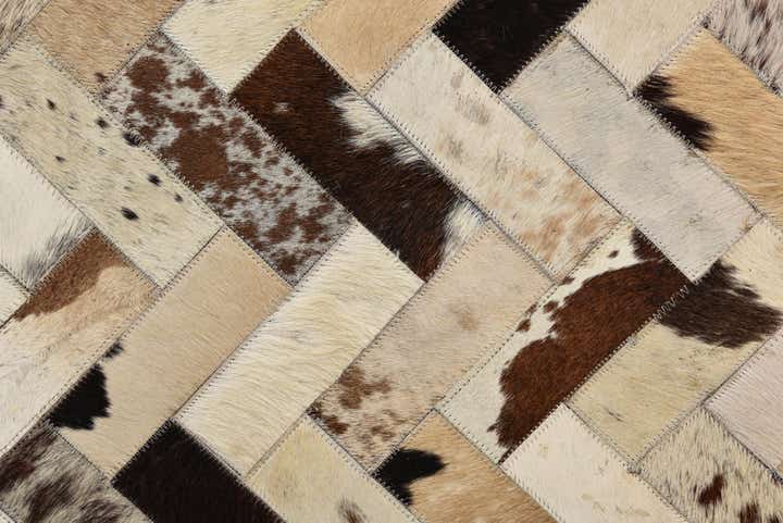 5' 3 x 7' 8 Cowhide Rug