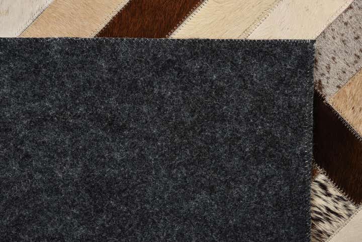 5' 3 x 7' 8 Cowhide Rug