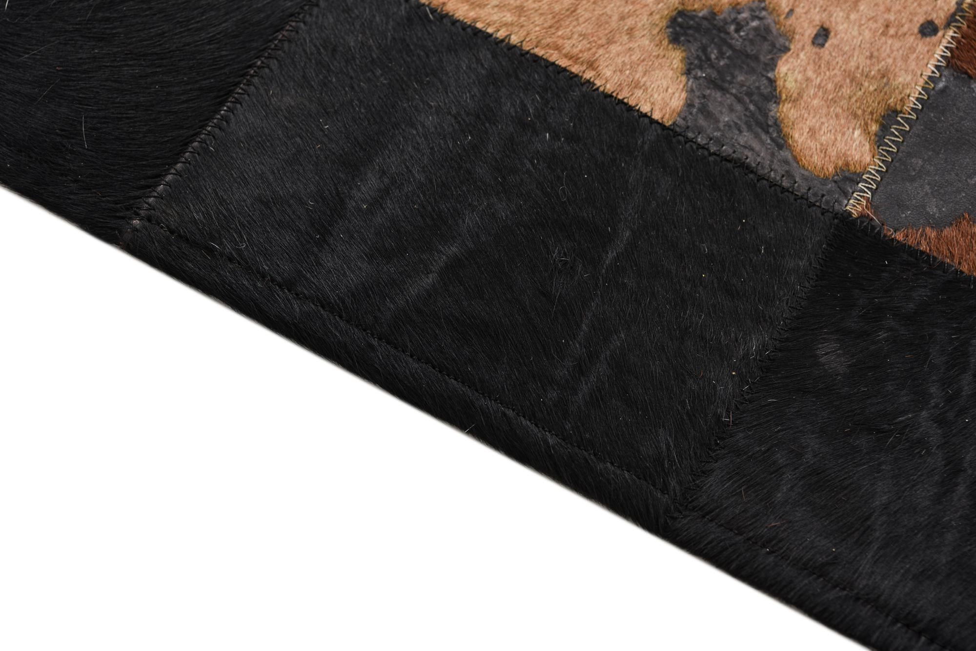 5' 1 x 7' 6 Cowhide Rug